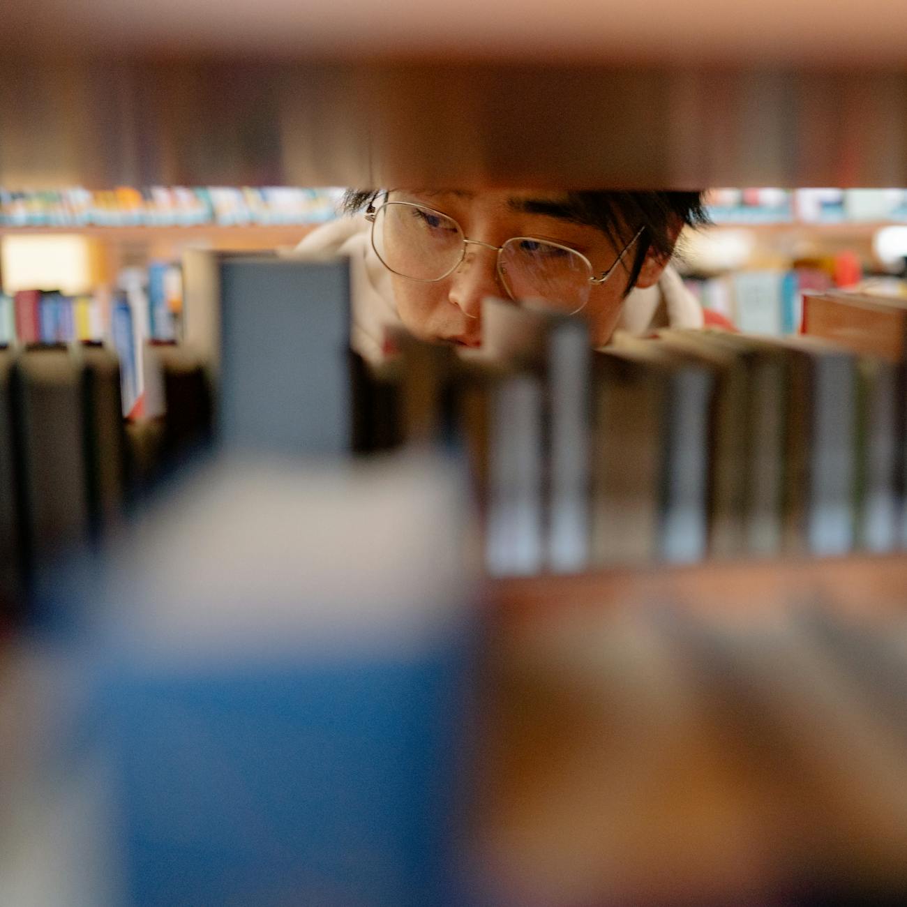 20 Best Data Science Books stacked on a table.